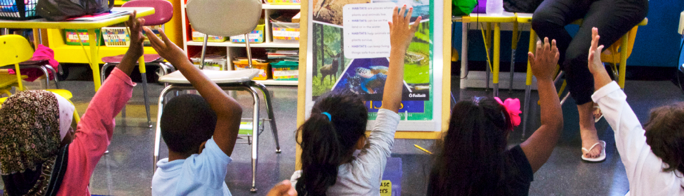 children learning to read in classroom settings