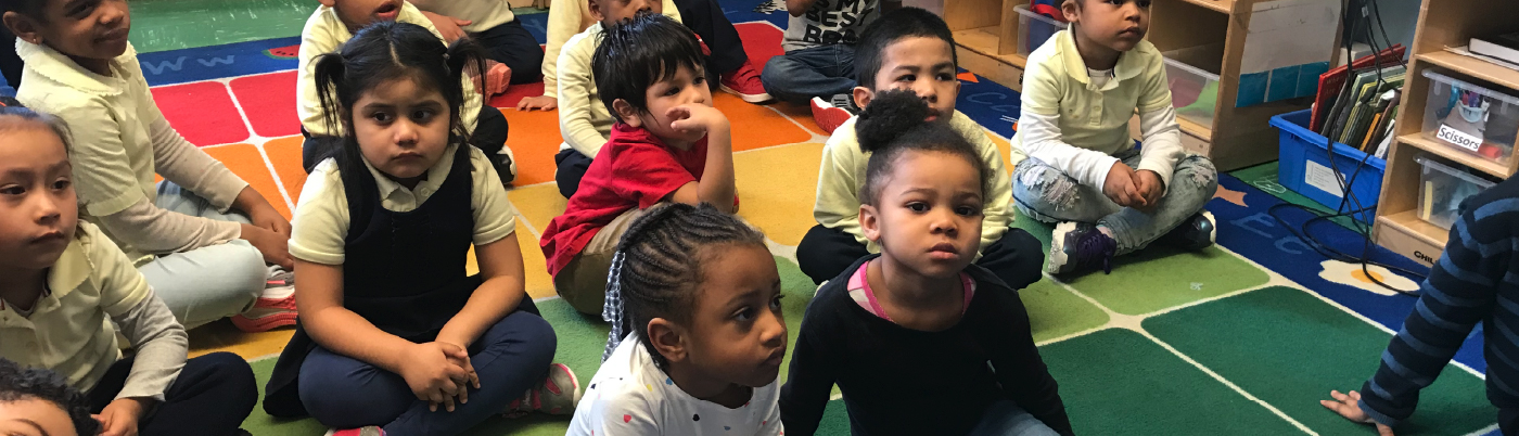 children learning to read in classroom settings