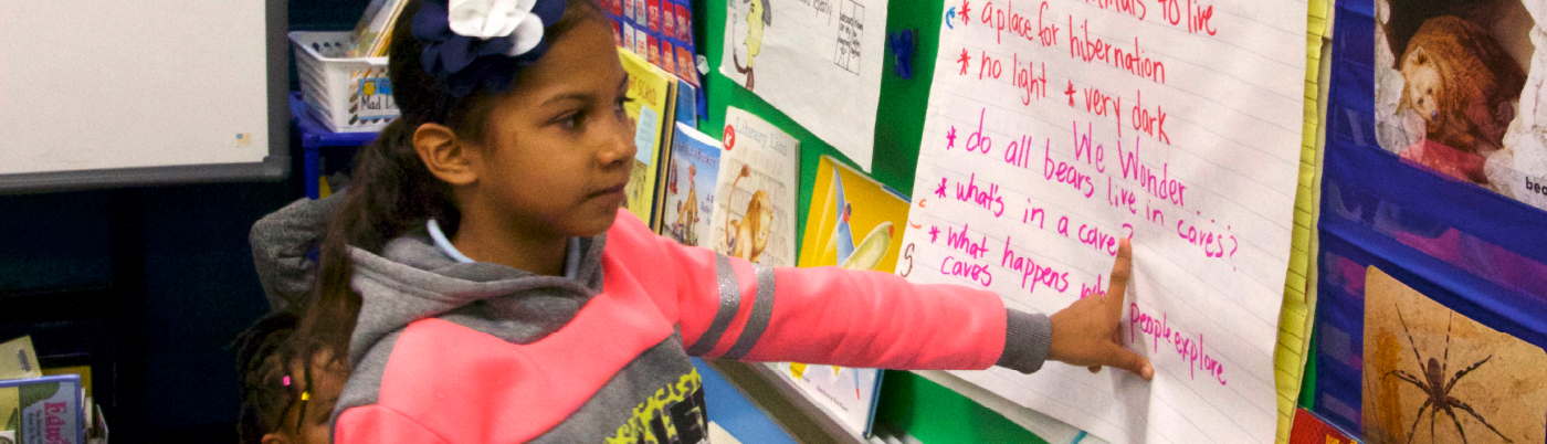 children learning to read in classroom settings